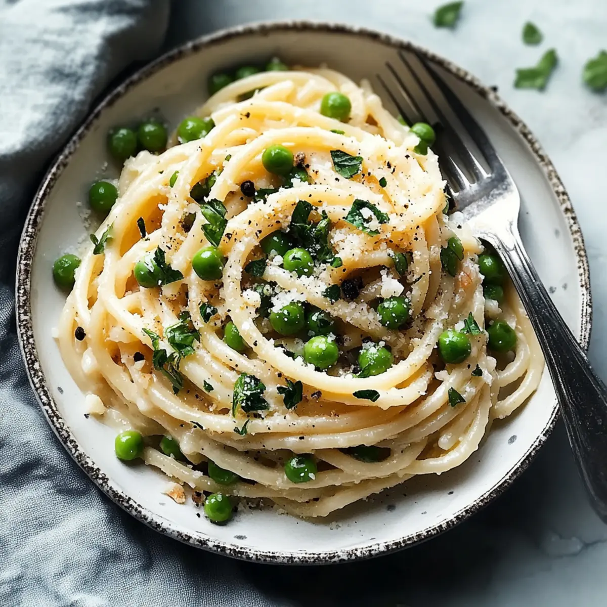 Garlic Cream Bucatini with Peas and Asparagus